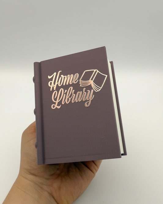 Lesezeichen- & Stiftehalter "Home Library"